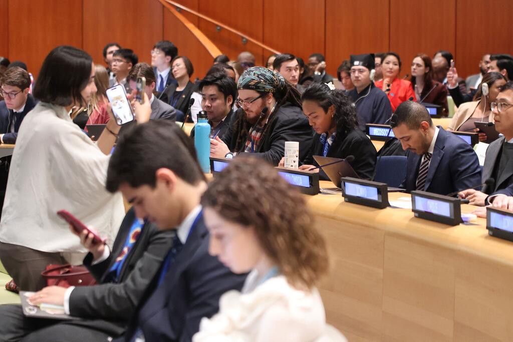Participants attend the ECOSOC Youth Forum at United Nations Headquarters in New York.